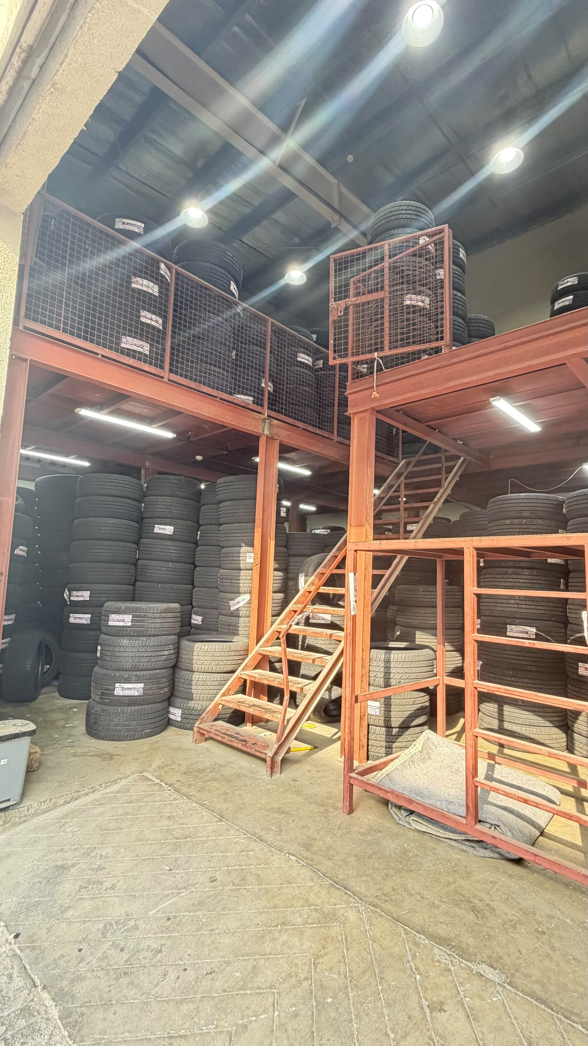 Stacked tyres inside Warehouse K5, Industrial Area No. 8, Sharjah